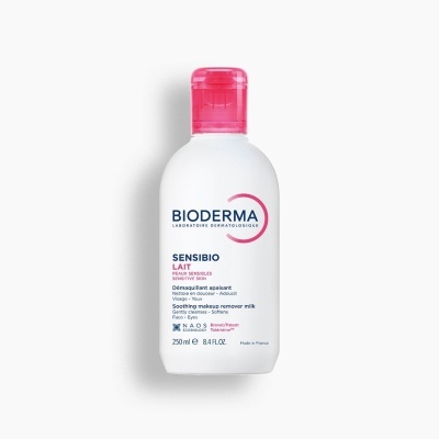Frasco plástico branco com tampa rosa de leite removedor de maquilhagem para pele sensível Bioderma