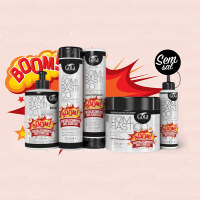 Produtos capilares Gota com etiquetas em branco, preto e vermelho, texto BOM BASTCO e booms, fundo rosa com explosão de cor vermelha