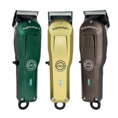 Três máquinas de cortar cabelo Skin Gamma+ em verde, dourado e castanho