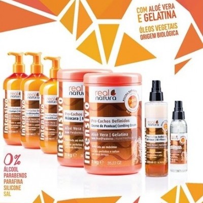 Produtos capilares real natura em embalagens laranja e branco com texto em português