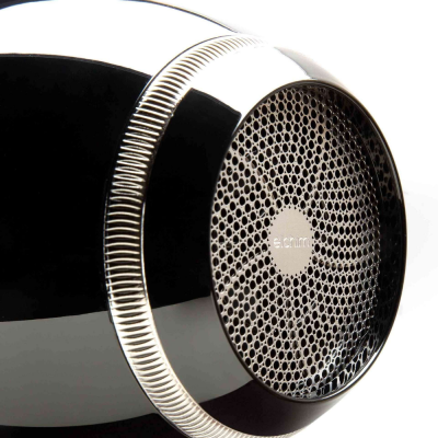 Parte traseira de secador de cabelo preto com grelha prateada e texto elchim
