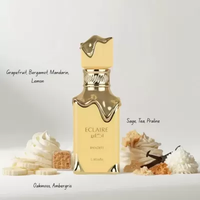 Frasco dourado de perfume ECLAIRE BANOFFI com elementos aromáticos ao redor
