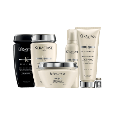 Conjunto de produtos Kérastase Paris para cuidados capilares em embalagens preta, creme e branca