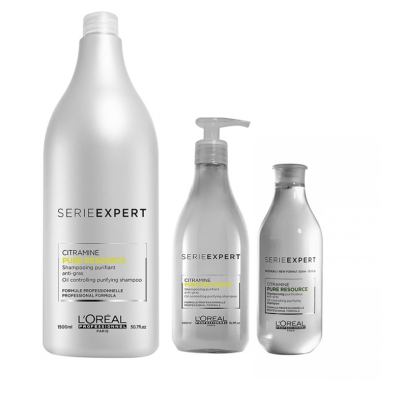 Três embalagens de champô Série Expert L'Oréal Professional em fundo branco