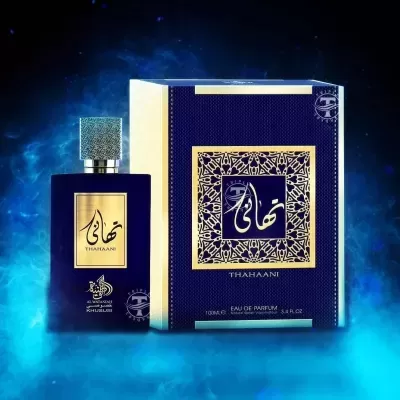 Frasco de perfume azul escuro e dourado THAHAANI com caixa na mesma cor e design