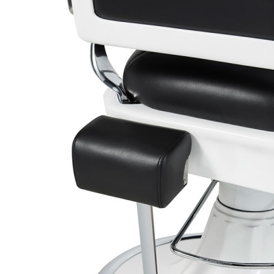 cadeira de barbeiro com estofos pretos e estrutura branca