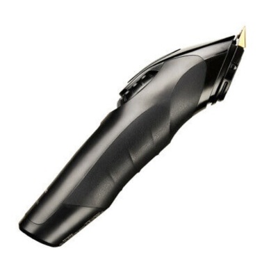 Aparelho de cortar cabelo preto com lâmina dourada