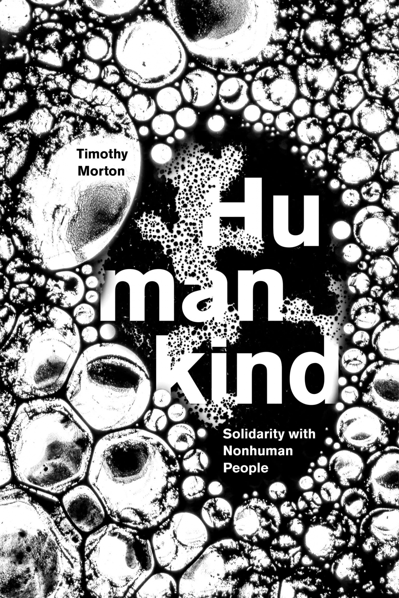 Humankind: Solidarity with Non-Human People Capa de livro preto e branco com padrão de bolhas e texto em branco
