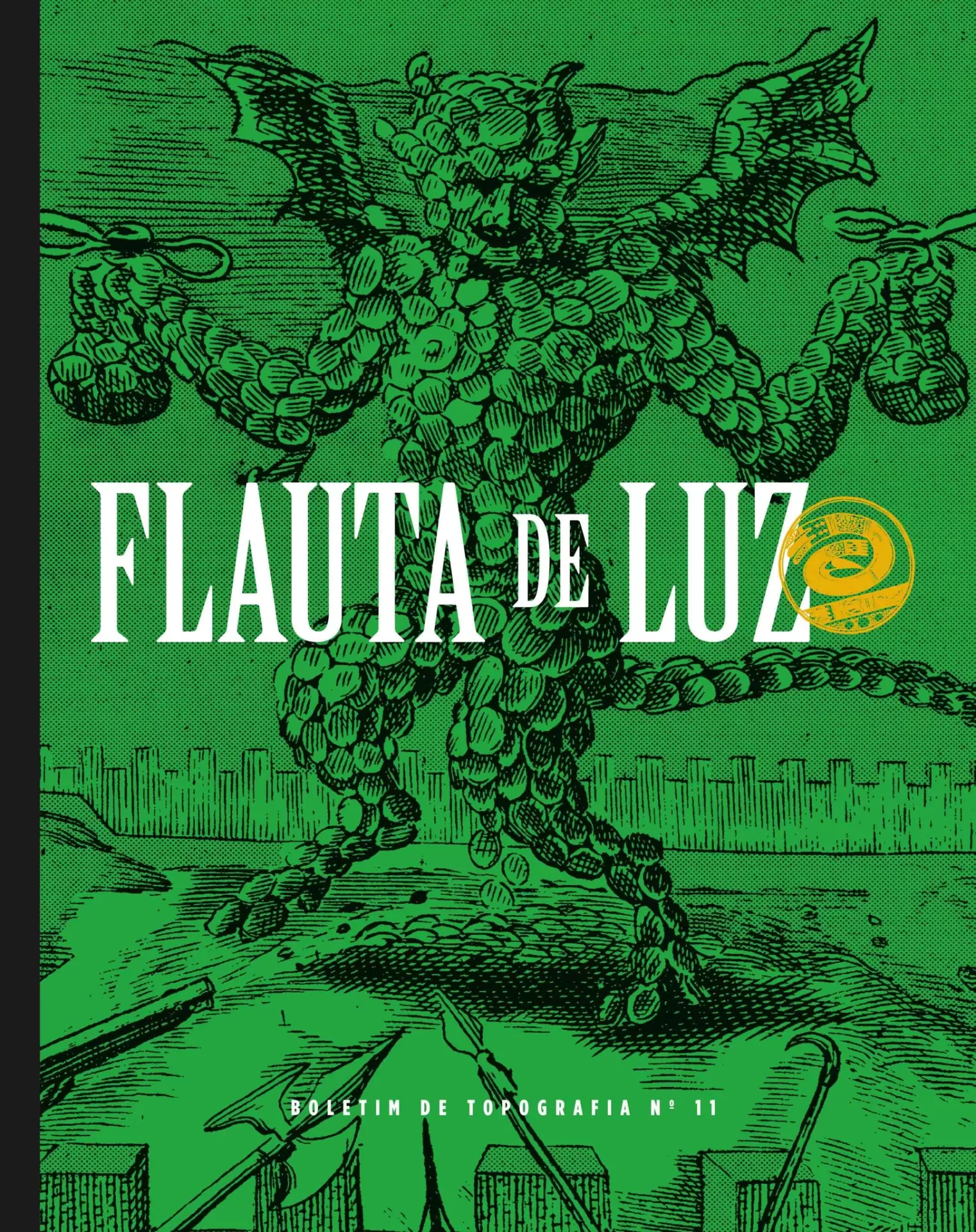 Flauta de Luz – n.º 11 Capa verde com ilustração de criatura feita de bolhas e texto FLUTA DE LUZ