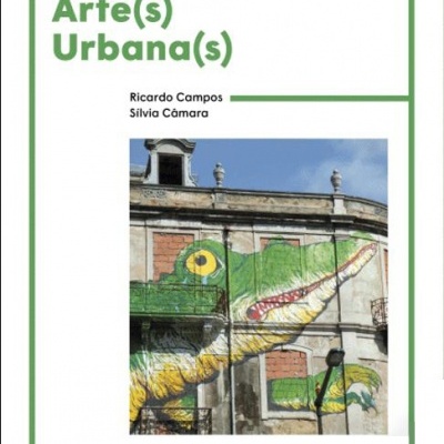 Capa do livro 'Arte(s) Urbana(s)' com mural urbano de um crocodilo pintado numa parede