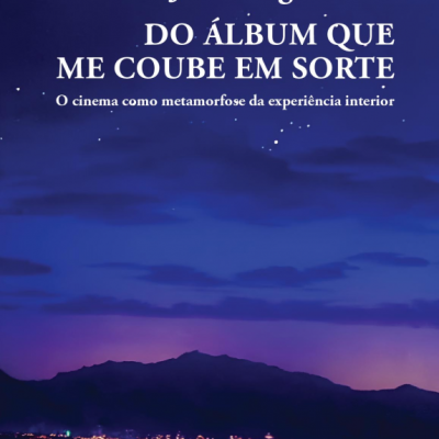 Capa de livro com título, autor e imagem de céu noturno com montanhas e luzes de cidade