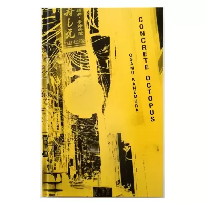 Livro amarelo e preto com fotografia urbana e texto CONCRETE OCTOPUS