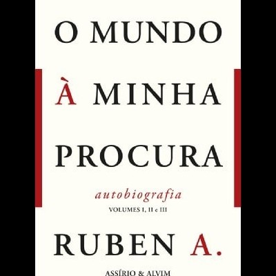Capa branca de livro com texto em preto e vermelho e título 'O MUNDO À MINHA PROCURA'.