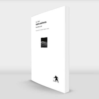 Livro de capa branca 'TERRA INCÓSPITA' com imagem preta e figura humana