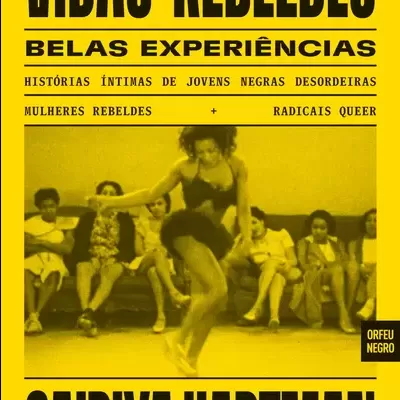 Capa de livro amarela com texto preto e imagem de pessoa a dançar