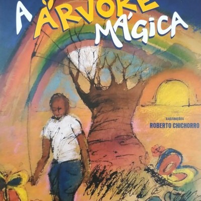 Capa de livro A Árvore Mágica com ilustração colorida de criança, árvore, arco-íris e borboletas