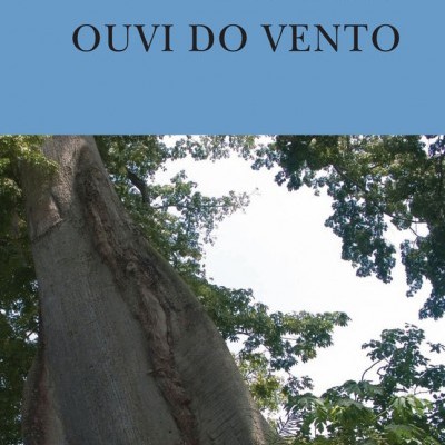 Capa do livro 'OUVI DO VENTO' com imagem de árvores e fundo azul