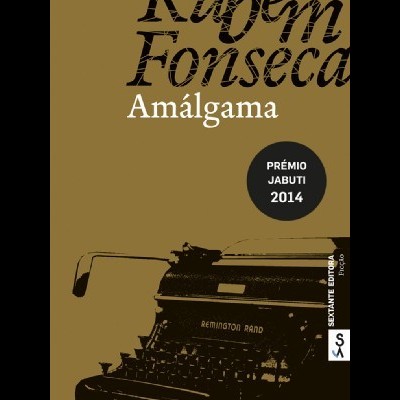 Capa do livro Amálgama de Ruben Fonseca com uma máquina de escrever Remington Rand e selo PRÉMIO JABUTI 2014.