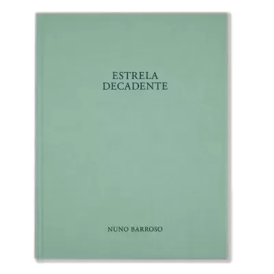 Livro capa dura verde claro com título 'ESTRELA DECADENTE' e autor 'NUNO BARBOSA'