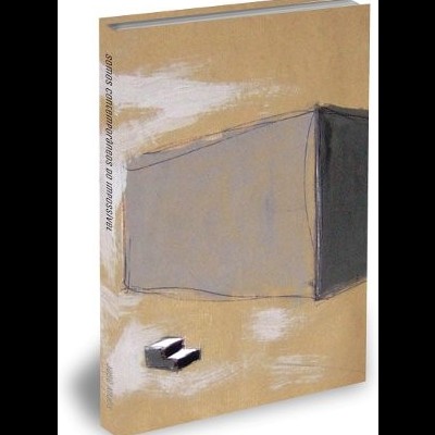 Livro com capa abstrata em bege, cinza e preto com texto na lombada