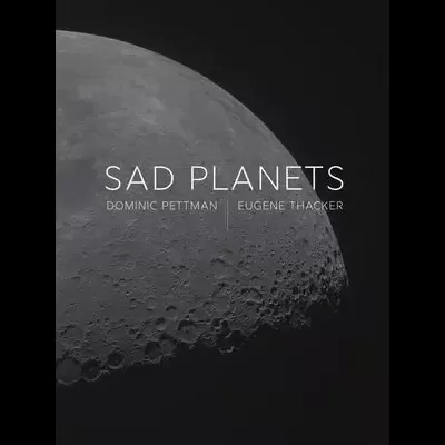 Capa de livro com a superfície da lua e texto 'SAD PLANETS'.