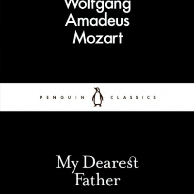 Capa de livro preto com texto branco e logo do pinguim no centro.