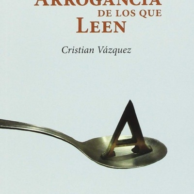 Capa de livro com texto e colher contendo letra A em metal