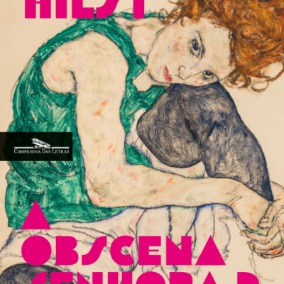 capa de livro com mulher ruiva sentada e texto em rosa
