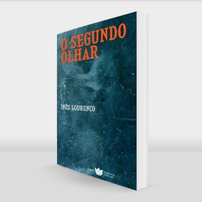 Livro O SEGUNDO OLHAR com capa azul-esverdeada texturizada em fundo neutro