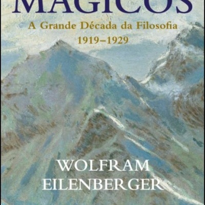 Capa de livro com montanhas pintadas e título 'O TEMPO DOS MÁGICOS'