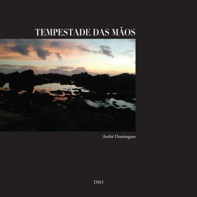 Capa de livro com título TEMPESTADE DAS MÃOS e foto de pôr do sol sobre rochas