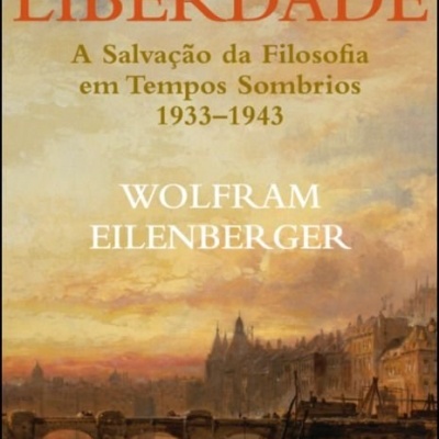 Capa de livro O FOGO DA LIBERDADE com título, autor e pintura de cidade ao pôr do sol