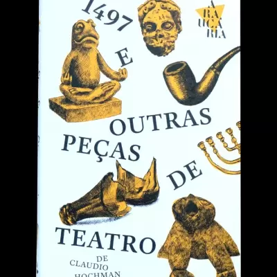 Capa de livro com esculturas douradas e título em preto