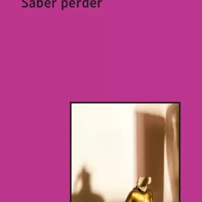 Capa de livro com título Saber perder e imagem de escultura dourada