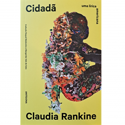 Capa de livro amarelo com título e figura humana floral