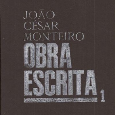 Capa preta de livro com texto prateado OBRA ESCRITA 1