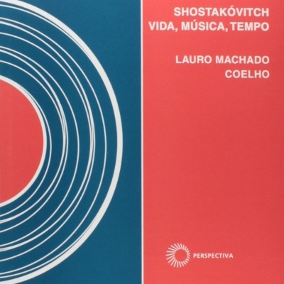 Capa de livro azul e vermelha com círculos brancos e texto em branco