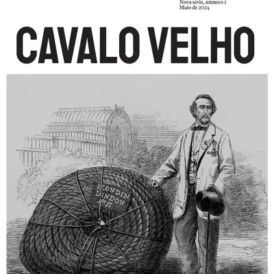 Capa de almanaque com homem ao lado de balão aerostático preto e branco