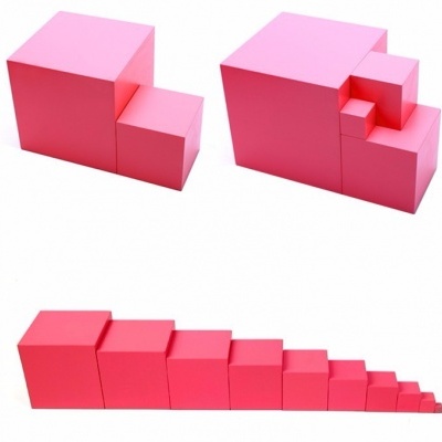 Conjunto de blocos cor-de-rosa de tamanhos variados organizados em sequência e pilhas