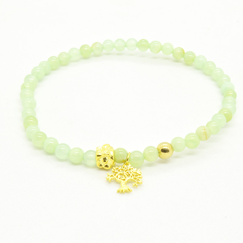 Pulseira Árvore da Vida e Pedras Naturais Pulseira verde com contas redondas e elementos dourados, incluindo um pendente de árvore.