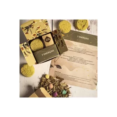 Caixa decorativa com discos amarelos e folheto explicativo sobre 7 ENERGIAS