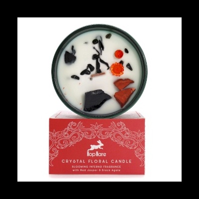 vela aromática com cristais em caixa vermelha