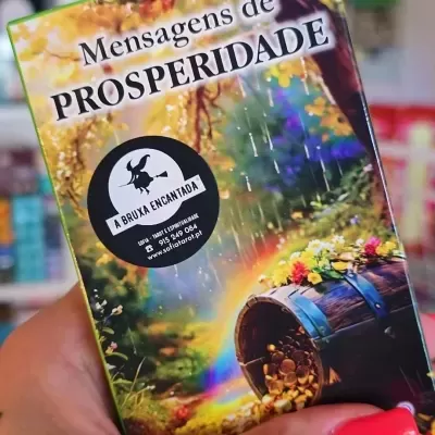 Livro Mensagens de Prosperidade com capa colorida e etiqueta preta A BRUXA ENCANTADA