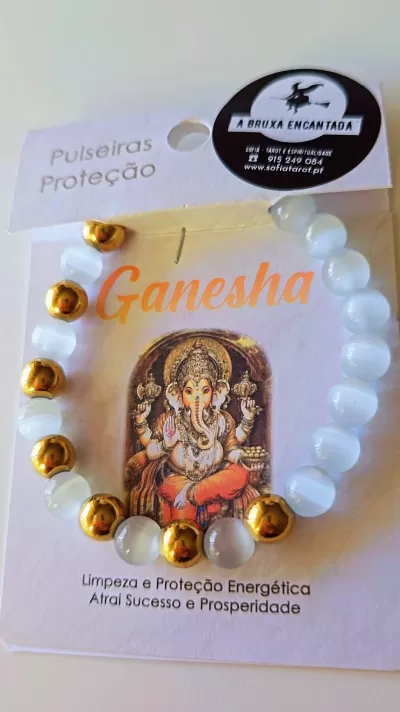 Pulseira branca e dourada com embalagem texto em português, imagem de Ganesha