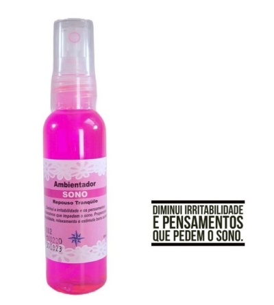 Frasco rosa de ambientador com rótulo 'Ambientador SONO Repouso Tranquilo'