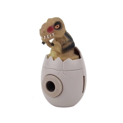 Brinquedo de dinossauro a sair de um ovo branco partido.