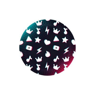 Disco circular com padrão branco de símbolos variados sobre fundo escuro com luzes vermelhas e verdes