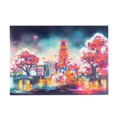 Quadro decorativo urbano noturno com árvores cor-de-rosa e luzes brilhantes