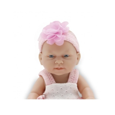Boneca bebé com roupa rosa e faixa de cabeça com laço