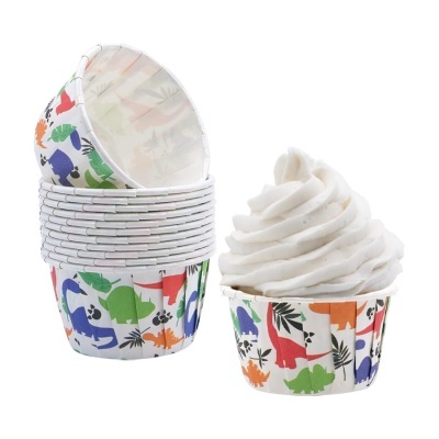 Forminhas de papel para cupcakes com padrão de dinossauros coloridos